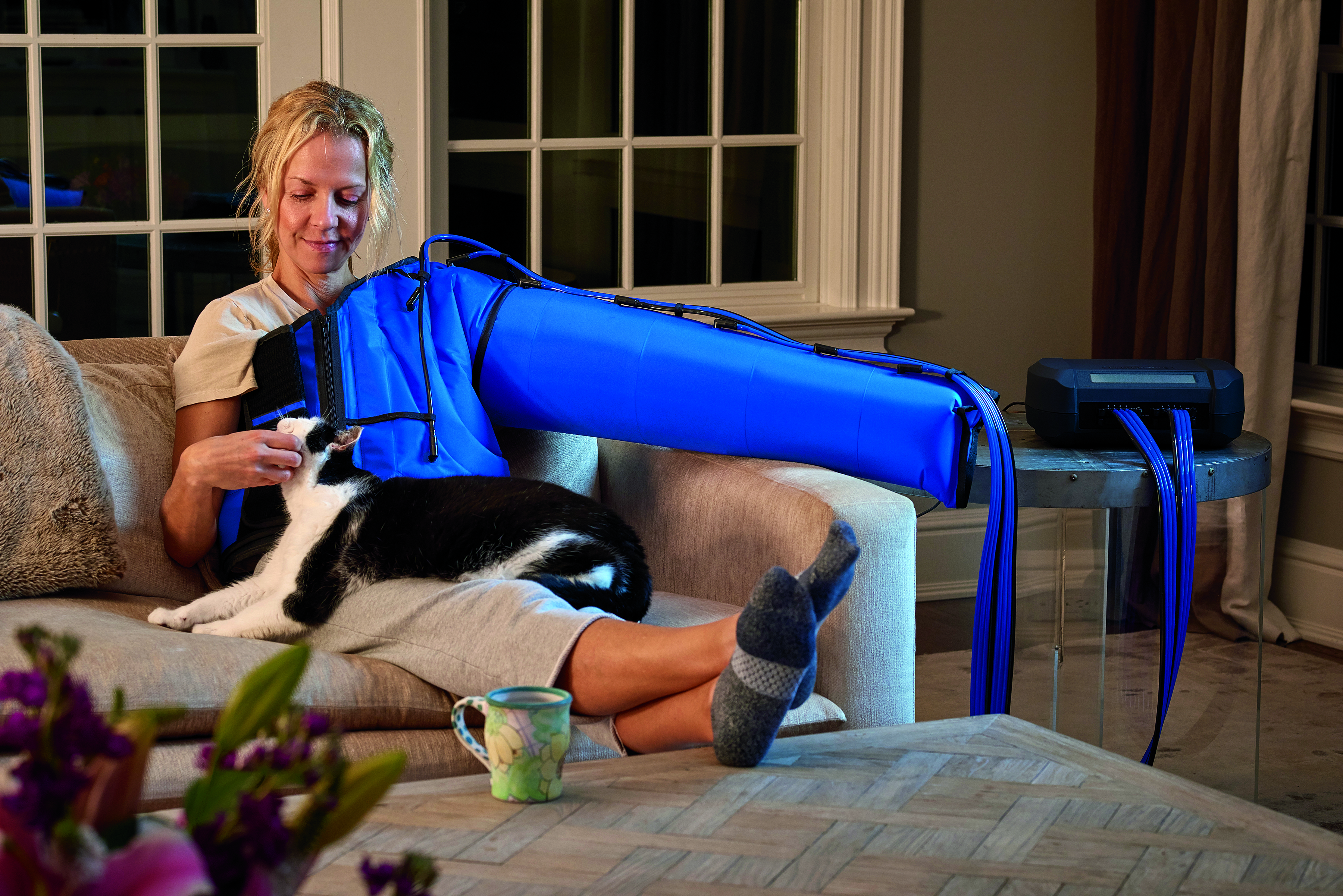 Patient using home compression therapy